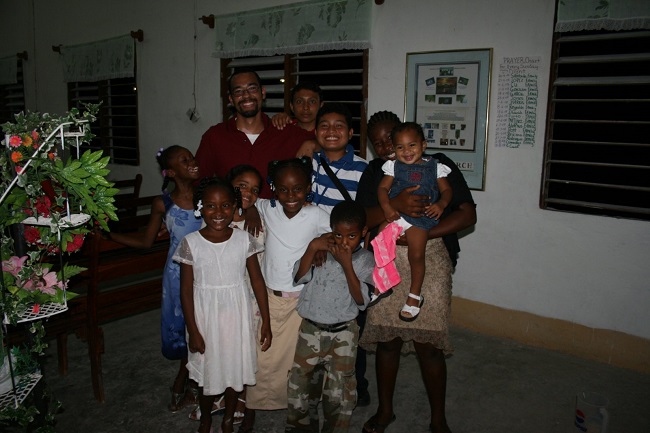 Gavin with children in Belize 2008.