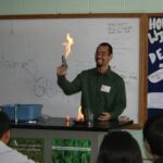 Gavin performing a science demonstration.