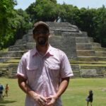 Gavin in front of a Maya Ruin in Belize.